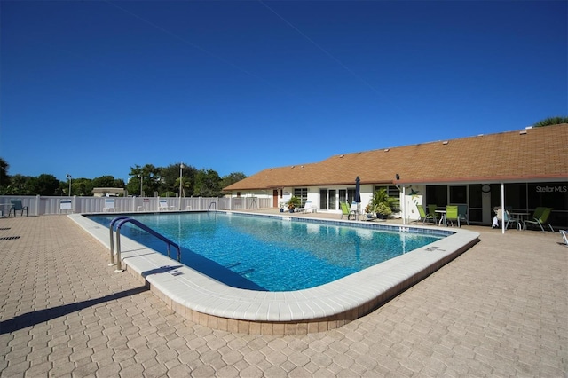 view of pool with a patio area