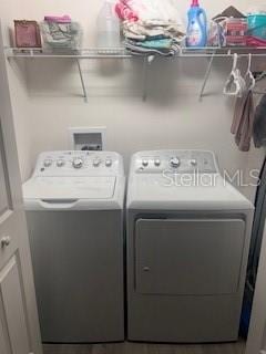 laundry area featuring washer and clothes dryer