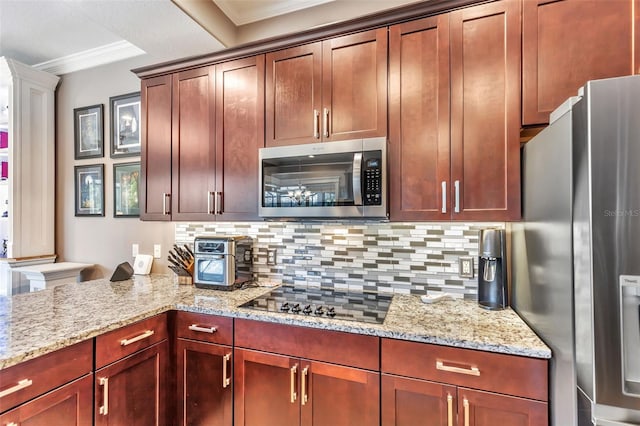 kitchen featuring appliances with stainless steel finishes, crown molding, light stone counters, and tasteful backsplash