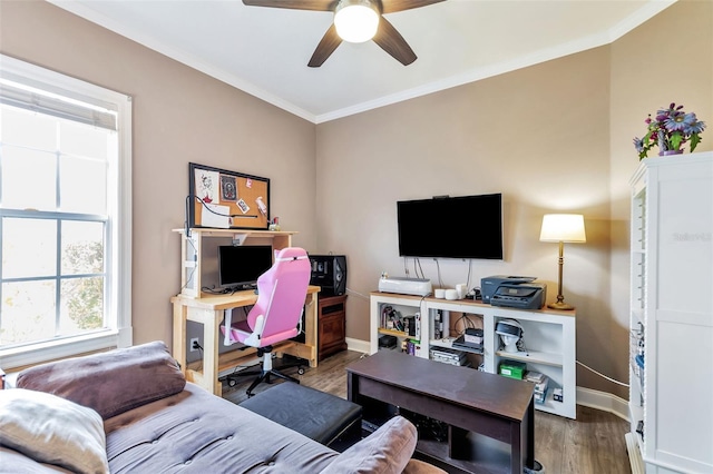 office with a ceiling fan, crown molding, baseboards, and wood finished floors