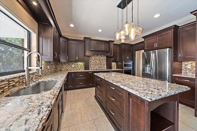 kitchen with a center island, open shelves, tasteful backsplash, appliances with stainless steel finishes, and a sink