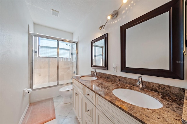 full bathroom featuring tile patterned flooring, visible vents, a sink, and toilet