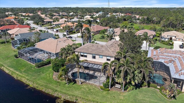 aerial view with a water view and a residential view