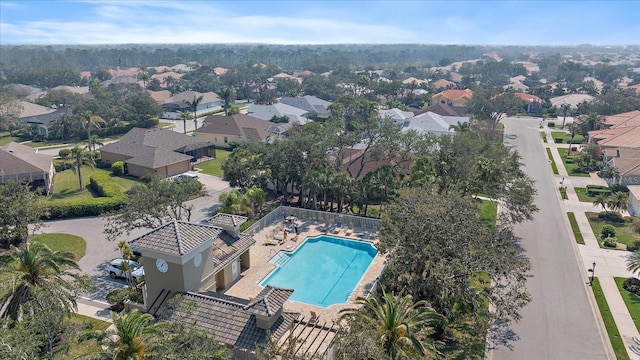 birds eye view of property with a residential view