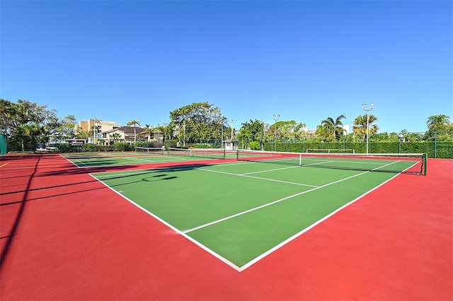 view of sport court featuring community basketball court and fence