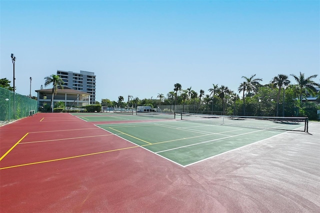 view of sport court featuring community basketball court and fence