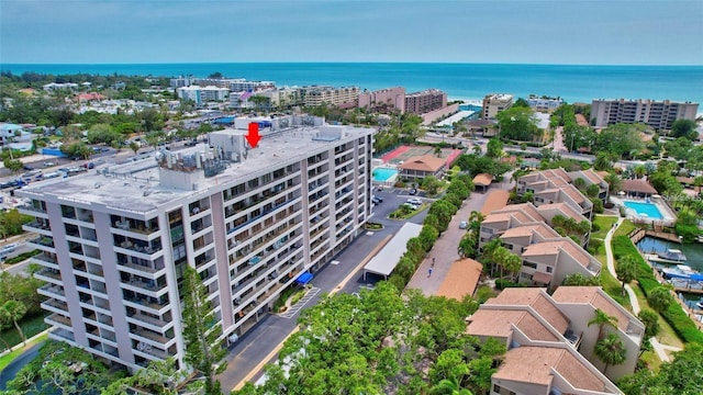 aerial view with a water view and a city view