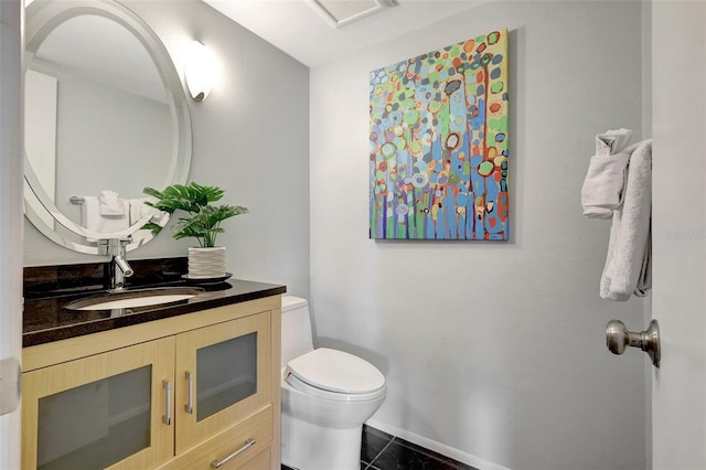 6415 Midnight Pass Rd Unit 211, Sarasota, FL 34242 - half bath with toilet, vanity, tile patterned flooring, and baseboards