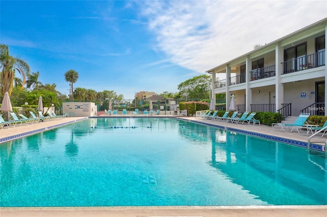 6415 Midnight Pass Rd Unit 211, Sarasota, FL 34242 - community pool with a patio area