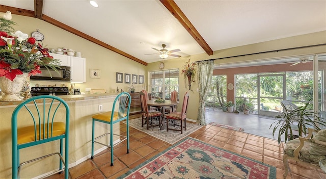 kitchen featuring lofted ceiling with beams, black appliances, ceiling fan, and white cabinetry