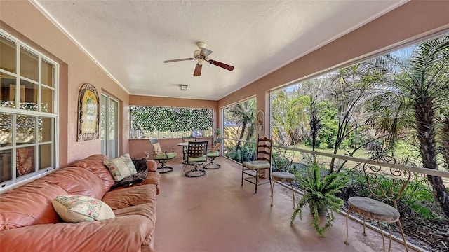 sunroom / solarium with ceiling fan