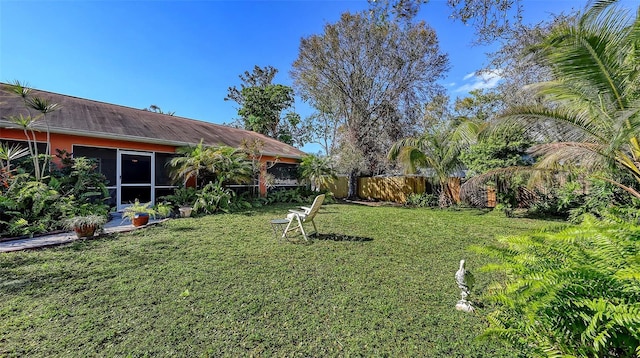 view of yard featuring fence