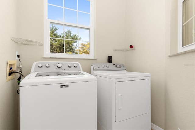 laundry room featuring laundry area and washer and clothes dryer