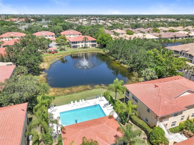 aerial view with a water view and a residential view