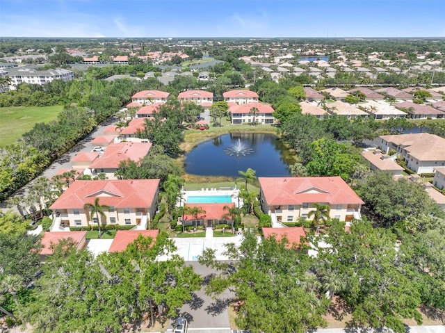 bird's eye view with a water view and a residential view