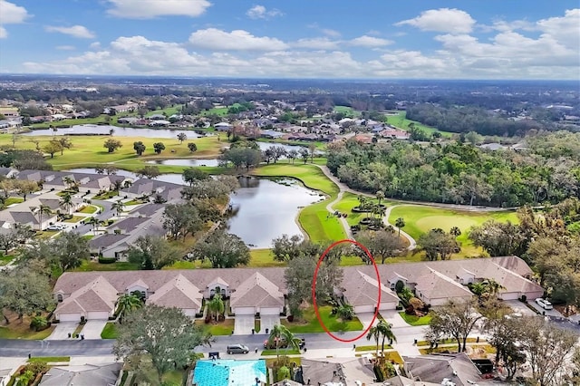 bird's eye view with a residential view, a water view, and golf course view