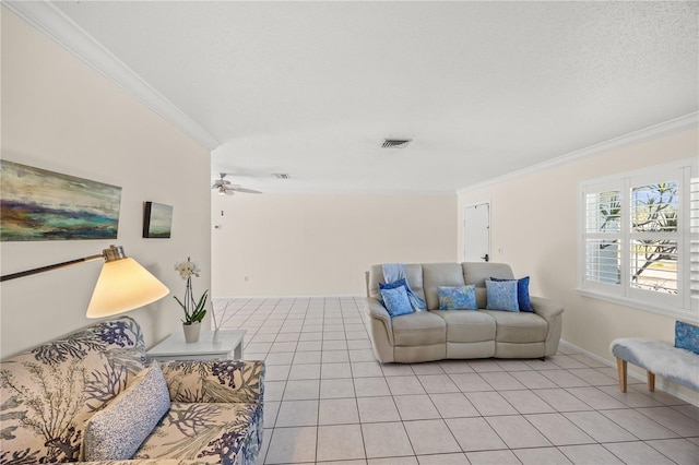 living room with crown molding, visible vents, light tile patterned flooring, ceiling fan, and a textured ceiling