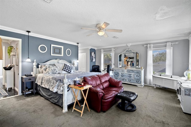 bedroom featuring ornamental molding, carpet flooring, and a textured ceiling