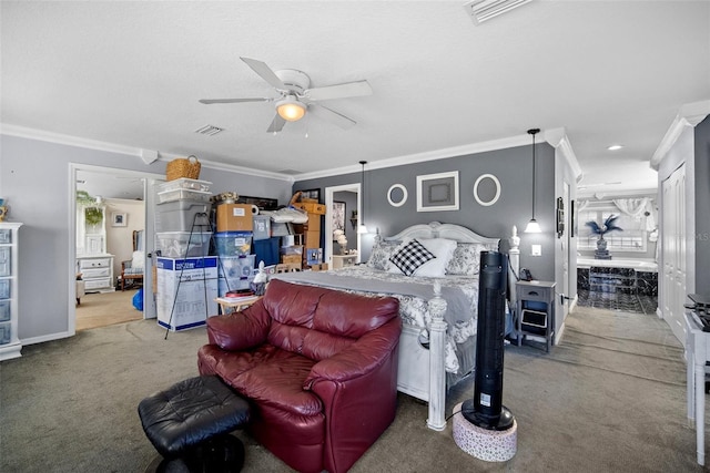 carpeted bedroom featuring crown molding and ceiling fan