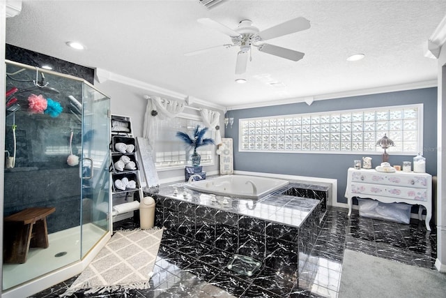 bathroom featuring ceiling fan, independent shower and bath, and a textured ceiling