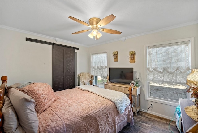 bedroom with dark wood-type flooring, ceiling fan, ornamental molding, and a barn door