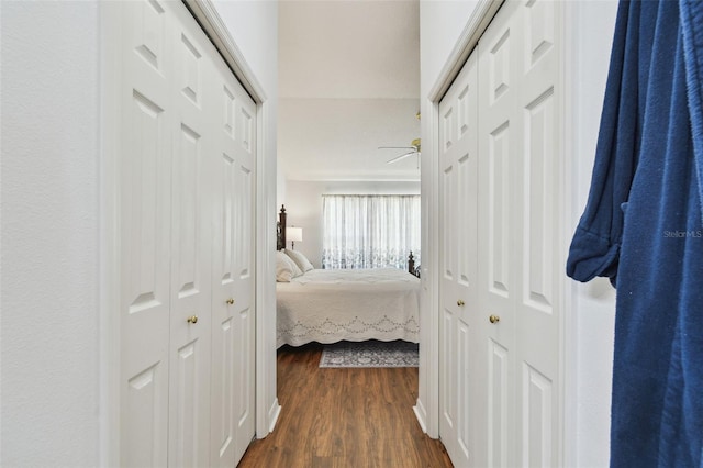 hall with dark wood-style floors