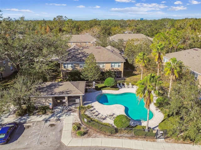 view of pool with a fenced in pool, a patio area, and fence