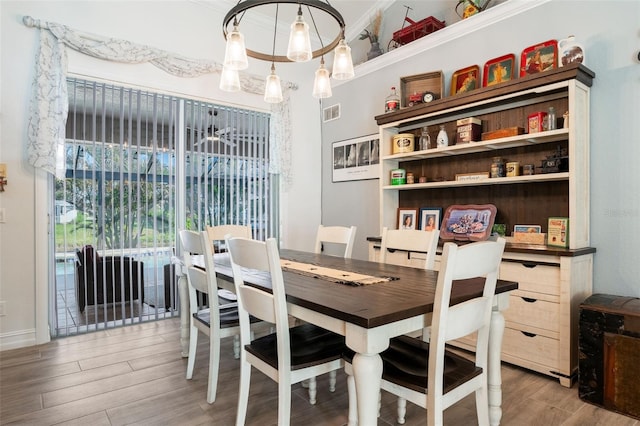 dining room featuring wood-type flooring