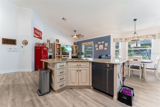 kitchen featuring sink, decorative light fixtures, a center island with sink, dishwashing machine, and light hardwood / wood-style floors