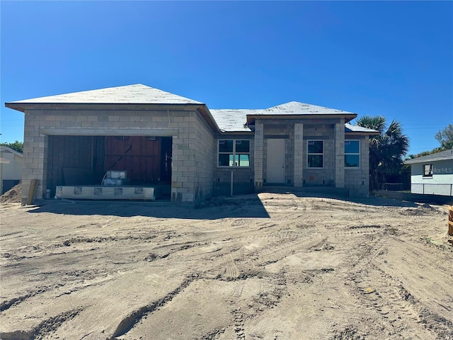 view of front of home with a garage