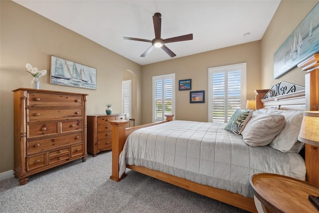 bedroom featuring ceiling fan and light colored carpet