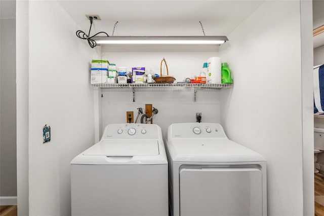 laundry area featuring laundry area and separate washer and dryer