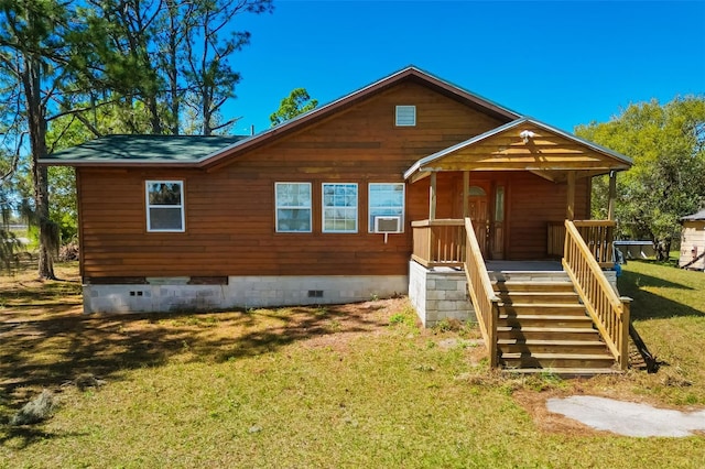 exterior space with crawl space, stairway, and a yard