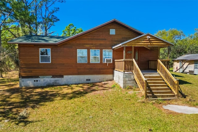 back of house with a yard, cooling unit, covered porch, and crawl space