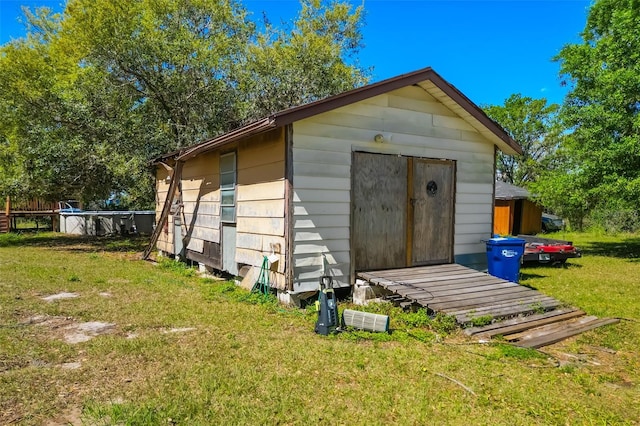 view of shed with an outdoor pool