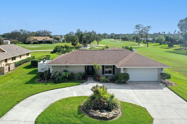 ranch-style home featuring a front lawn and a garage