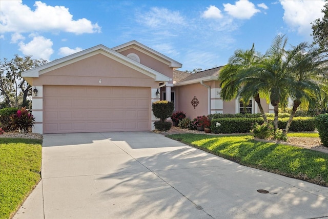 single story home featuring stucco siding, a garage, concrete driveway, and a front lawn