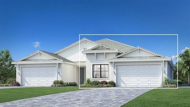 view of front facade with a garage and a front lawn