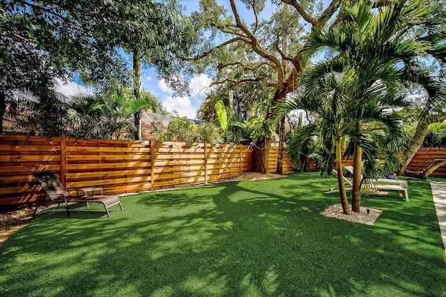 view of yard with fence