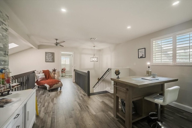 interior space with dark wood finished floors, recessed lighting, visible vents, lofted ceiling with beams, and baseboards