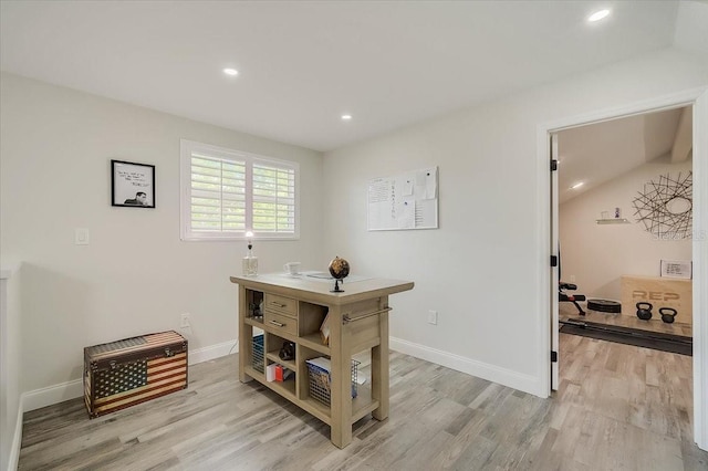 office space featuring light wood-style floors, baseboards, and recessed lighting