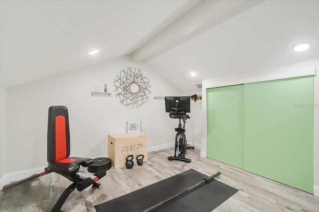 workout room featuring lofted ceiling, recessed lighting, wood finished floors, and baseboards