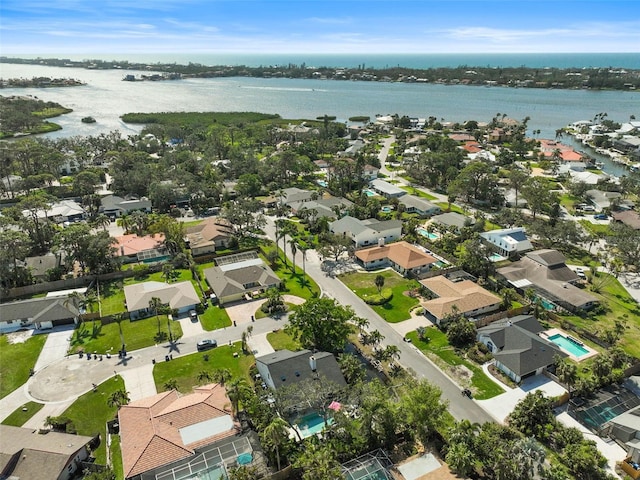 aerial view with a water view and a residential view