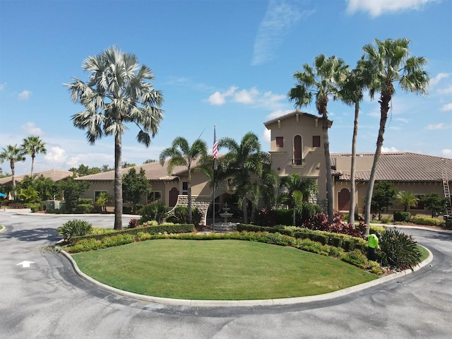 view of property with driveway