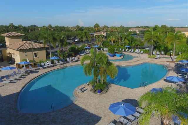 pool with a patio area