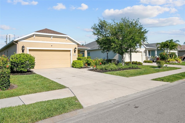 view of front of home featuring a front yard and a garage