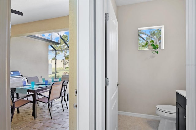 bathroom with vanity and toilet