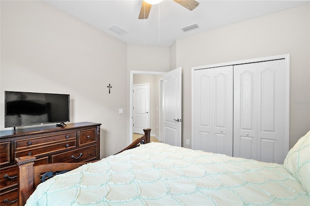 bedroom with ceiling fan and a closet