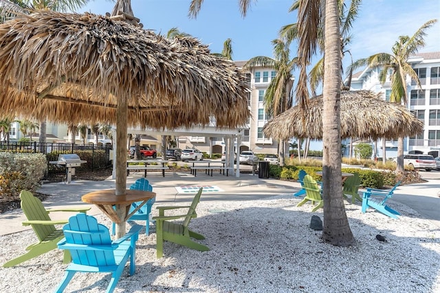 surrounding community featuring a gazebo and fence