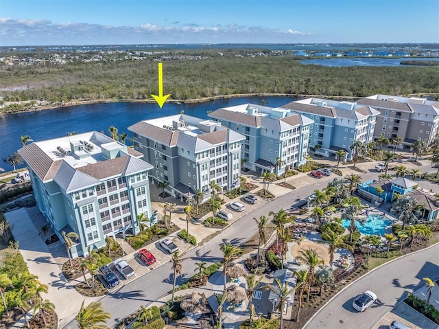 drone / aerial view with a water view